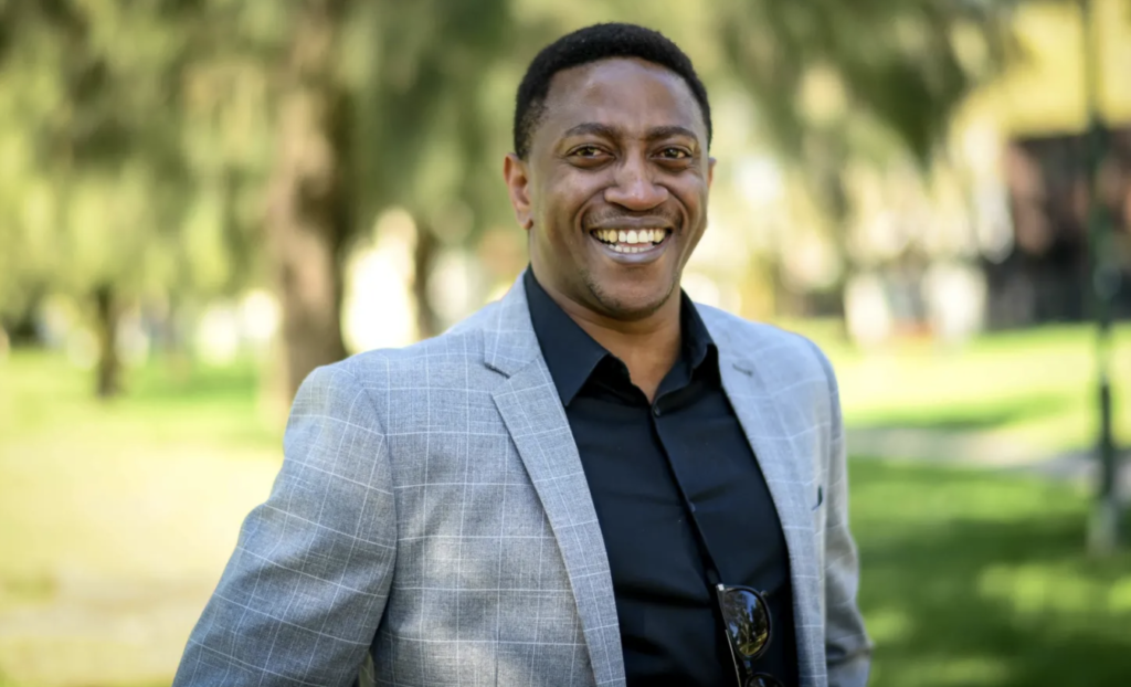Dozie has an MBA but worked as a car salesman – until he met Alex